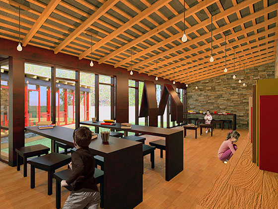 Inside the Library wing of LiangMeng School Library, some children read books in the unfolded tables, while others play in the flexible space.